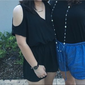 black “cold shoulder” romper